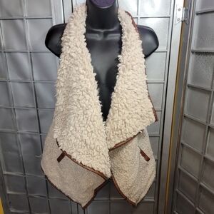 Altar'd state size small 18% wool and 18% Lana tan lined with brown leather vest